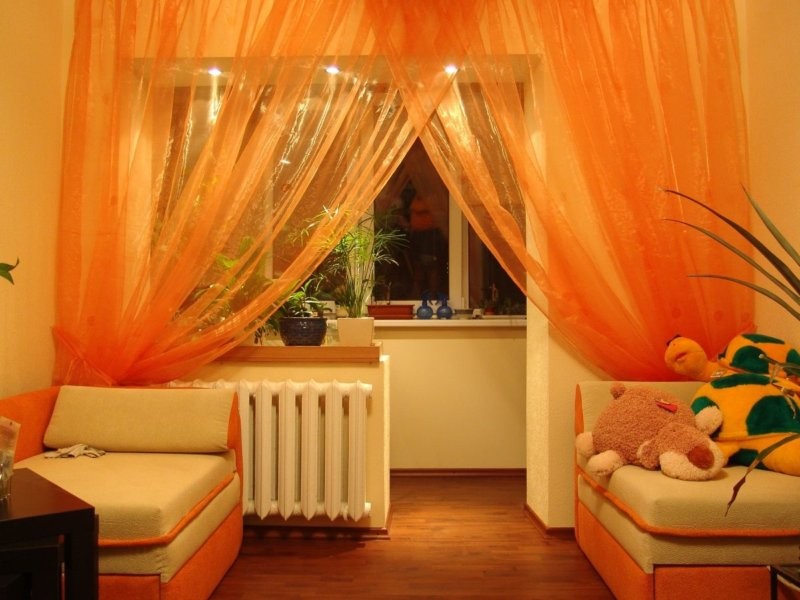 Оранжевые шторы: советы по выбору и применению